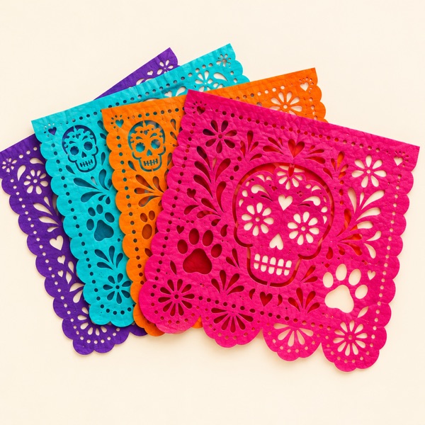 A fan of colorful papel picado sheets
